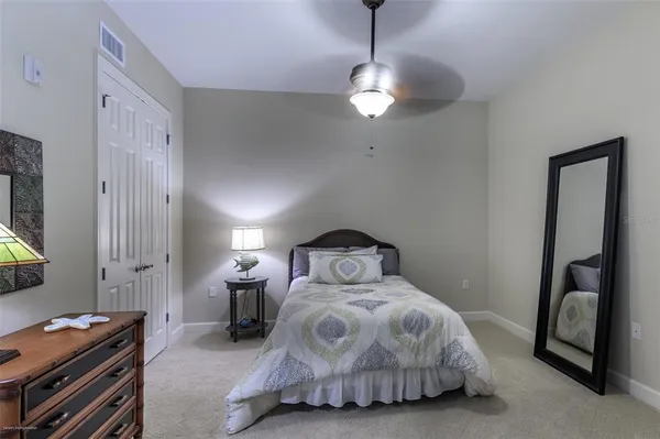 a bathroom with a shower and a glass door