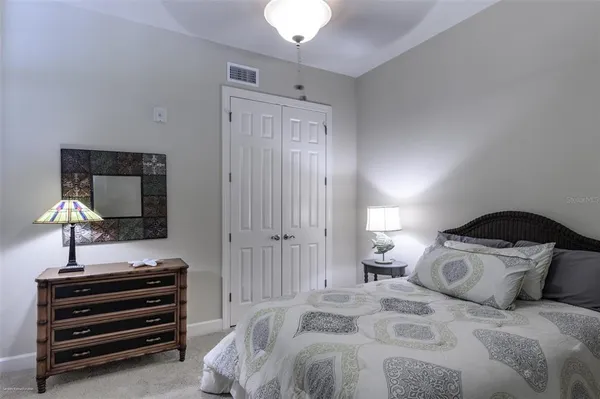 a kitchen with stainless steel appliances granite countertop a stove and a refrigerator