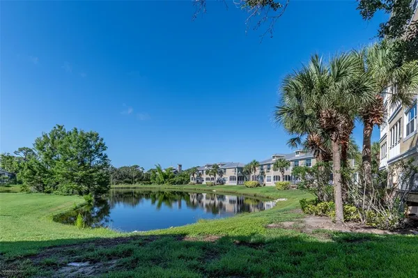 a view of a livingroom with workspace and a couch