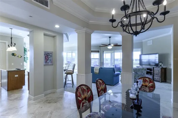 a dining room with furniture window and outdoor view