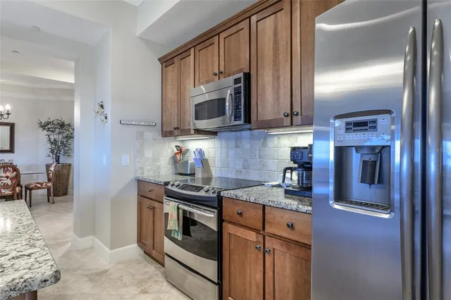 a view of a living room and a balcony