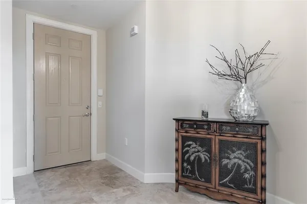 a living room with a couch and a window