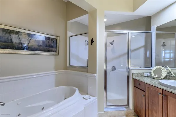 a view of a swimming pool with a patio