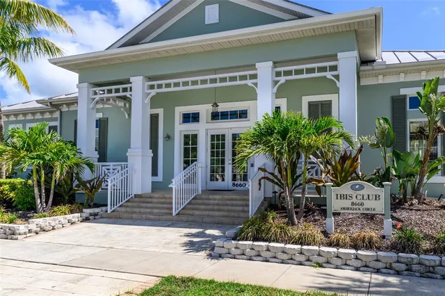 a view of a swimming pool with a patio