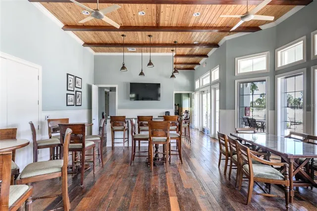 a patio with a table and chairs