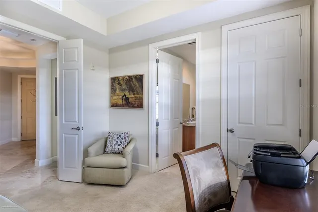 a bedroom with a bed and a dresser in it