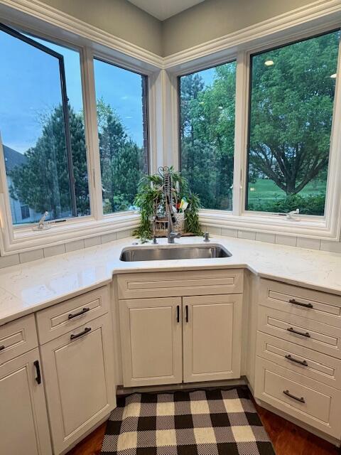 9261 Ruth Court St. John, IN 46373 - Photo 10 of 48 a kitchen with a sink and large window