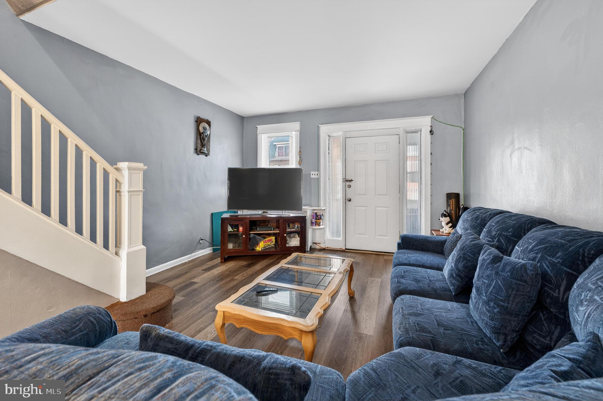 1330 South Merrimac Road Camden, NJ 08104 - Photo 4 of 17 a living room with furniture and a flat screen tv