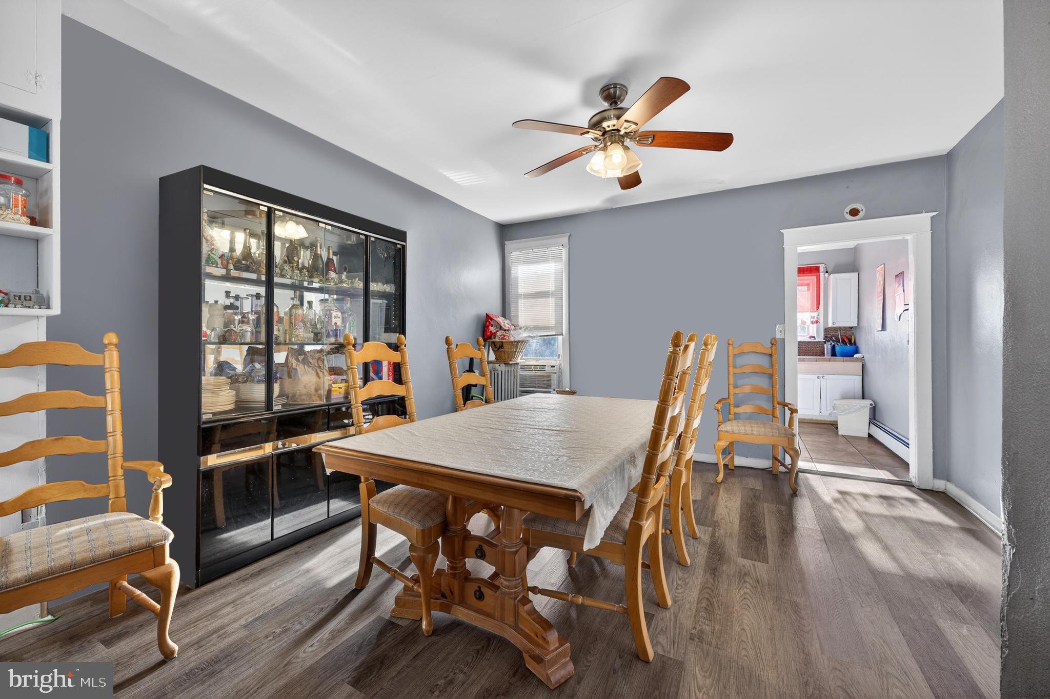 1330 South Merrimac Road Camden, NJ 08104 - Photo 5 of 17 a dining room with furniture and window