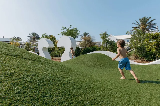 a patio with a patio table and chairs