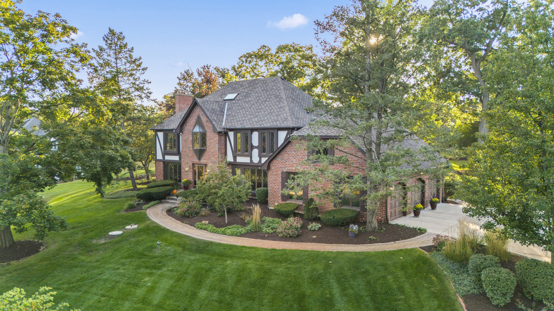 9 Equestrian Way Lemont, IL 60439 - Photo 27 of 32 a front view of a house with a yard