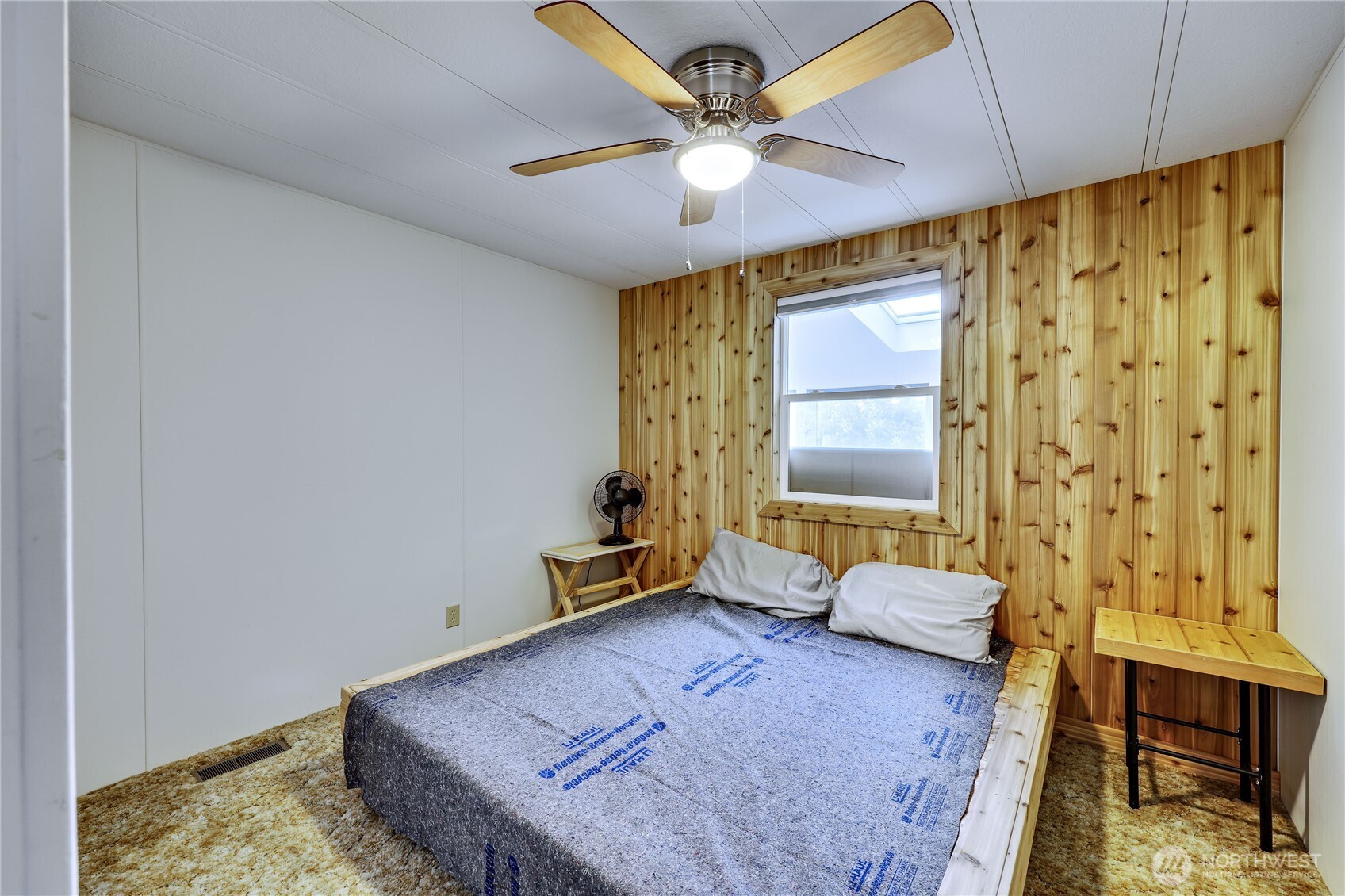 170 Cirque Drive Brinnon, WA 98320 - Photo 14 of 24 a spacious bedroom with a bed and a window