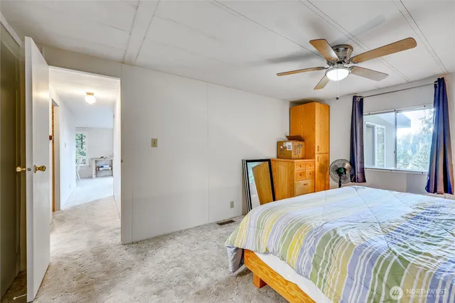 a spacious bathroom with a sink a toilet and a shower