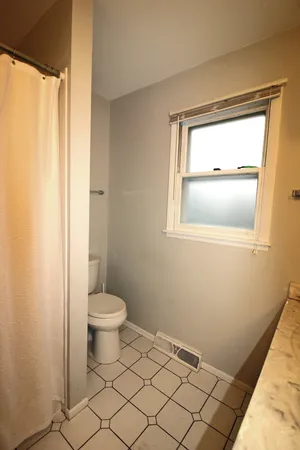 a bathroom with a toilet