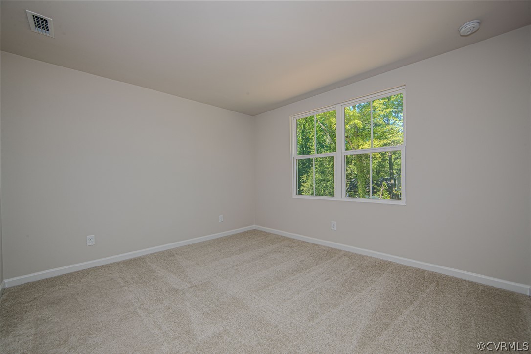 5357 Canterbury Ridge Richmond, VA 23224 - Photo 12 of 14 an empty room with a window
