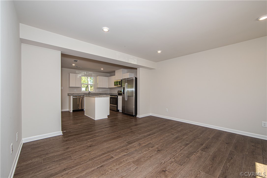 5357 Canterbury Ridge Richmond, VA 23224 - Photo 6 of 14 a view of a kitchen with a sink and wooden floor