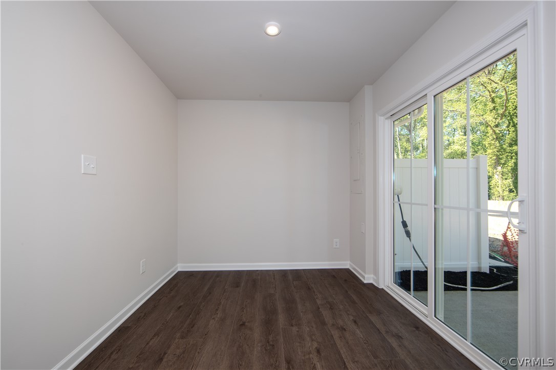 5357 Canterbury Ridge Richmond, VA 23224 - Photo 8 of 14 a view of a room with wooden floor and windows