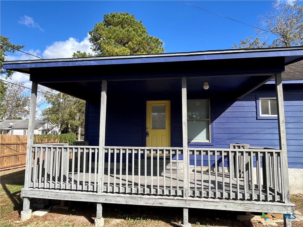 1017 West Nueces Street Victoria, TX 77901 - Photo 2 of 31 a view of a roof deck
