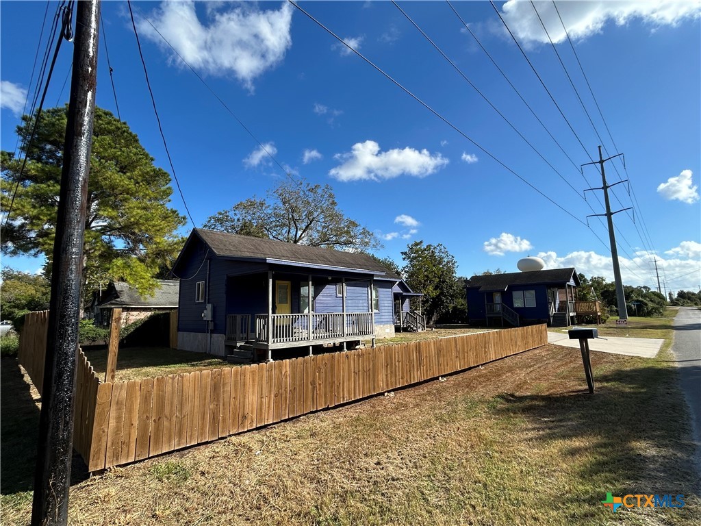 1017 West Nueces Street Victoria, TX 77901 - Photo 8 of 31 a view of a house with backyard and sitting area