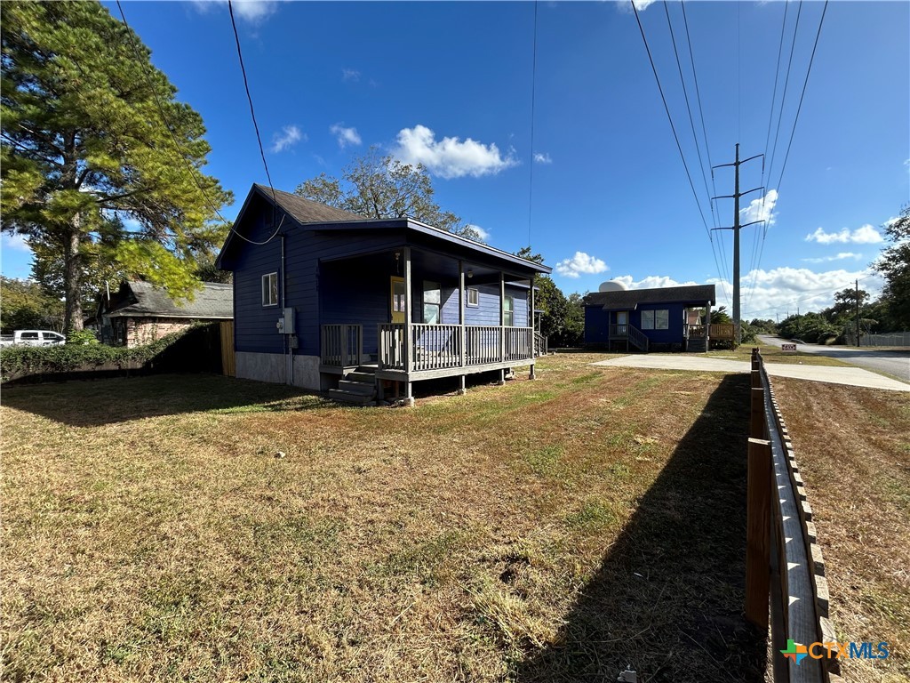 1017 West Nueces Street Victoria, TX 77901 - Photo 9 of 31 a view of a house with a patio