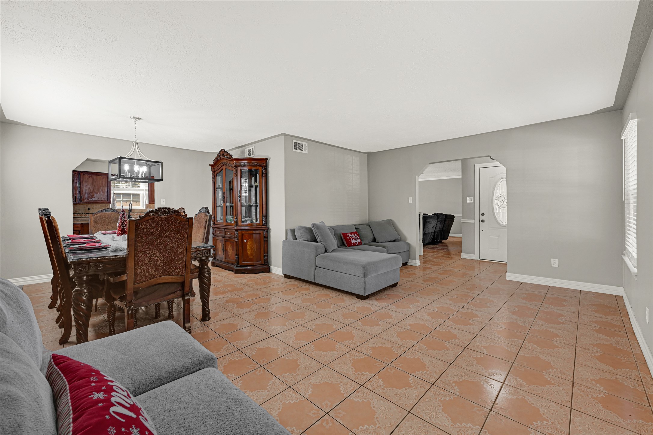 5007 Inverness Drive Baytown, TX 77521 - Photo 31 of 41 a living room with furniture and a dining table with chair