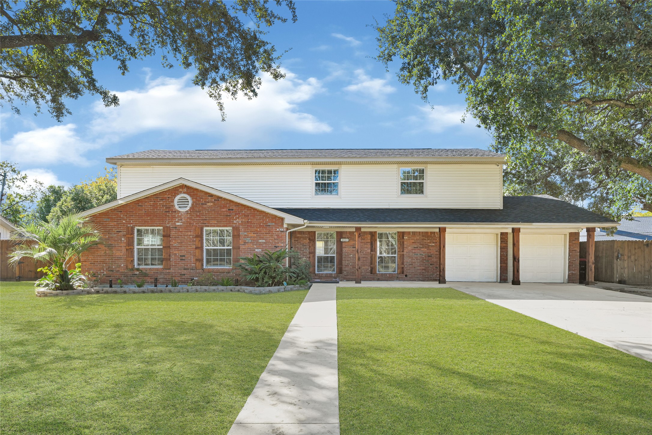 5007 Inverness Drive Baytown, TX 77521 - Photo 33 of 41 a front view of house with yard and green space