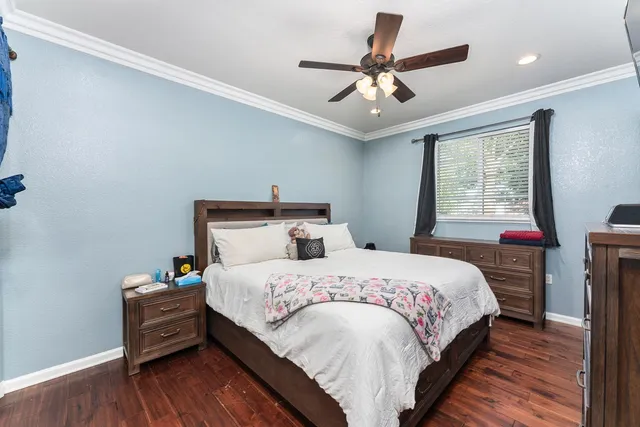 a kitchen with stainless steel appliances granite countertop a refrigerator sink stove microwave and cabinets