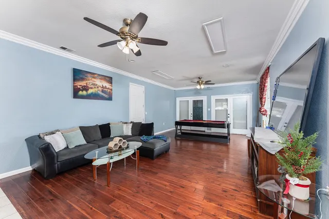 a front view of house with yard and trees