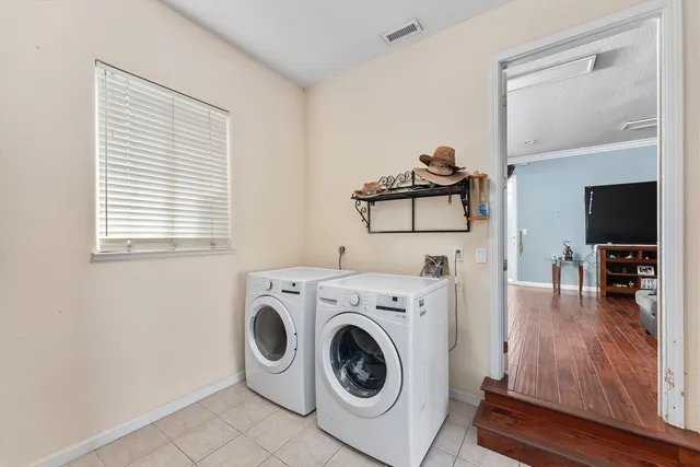 a view of outdoor dining space with a table and chairs