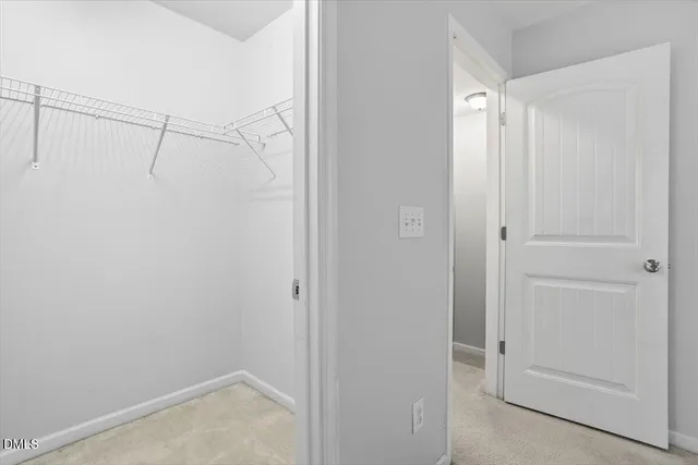 a view of an empty walk in closet