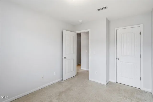 an empty room with closet