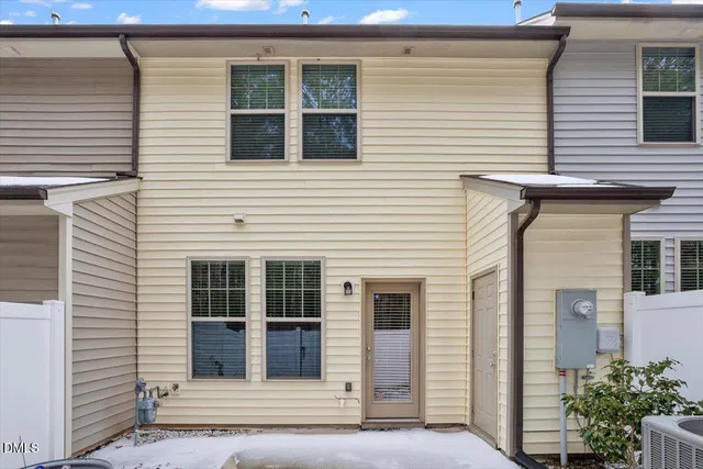 a view of a house with white door