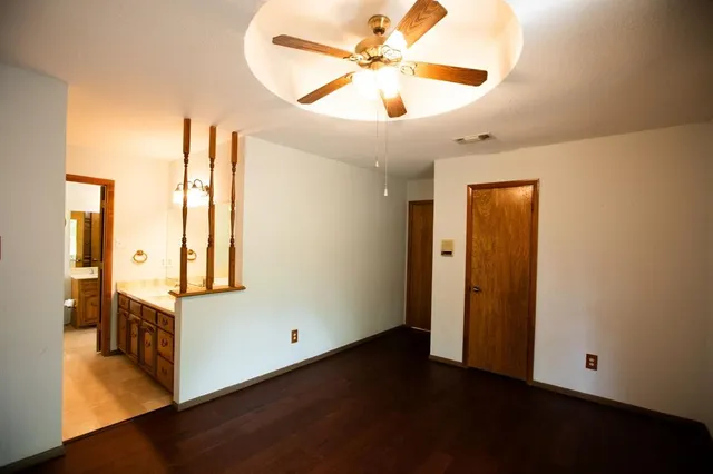 a bathroom with a toilet a sink and bathtub
