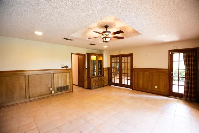 a view of balcony with wooden floor