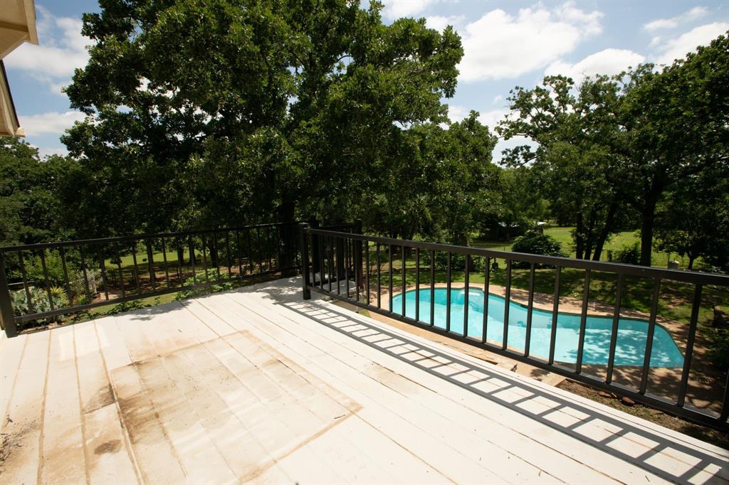 6837 Roberts Lane Fort Worth, TX 76140 - Photo 32 of 39 a view of balcony with wooden floor