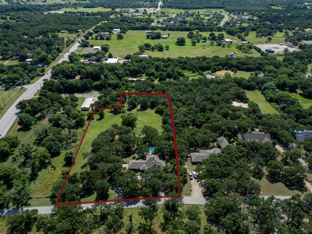 6837 Roberts Lane Fort Worth, TX 76140 - Photo 38 of 39 an aerial view of residential houses with outdoor space and trees