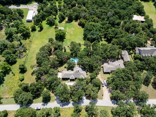a view of a dining room with furniture and window
