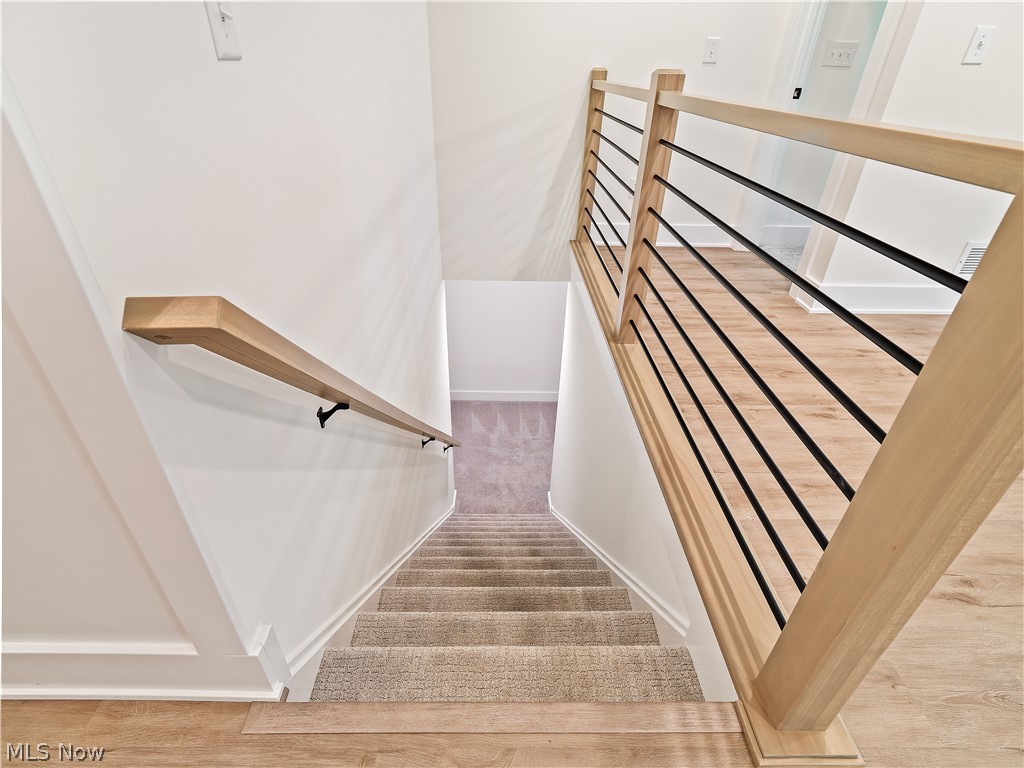 32 Brookside Lane North Ridgeville, OH 44039 - Photo 36 of 50 Stairs with carpet and baseboards