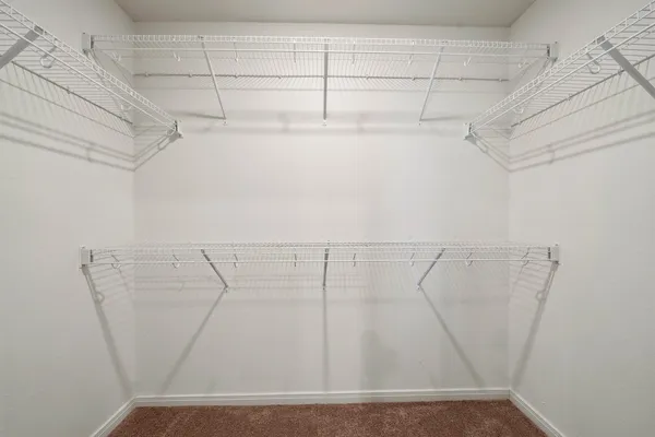 a view of a room with racks on the wall