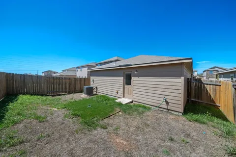 a view of a backyard with plants