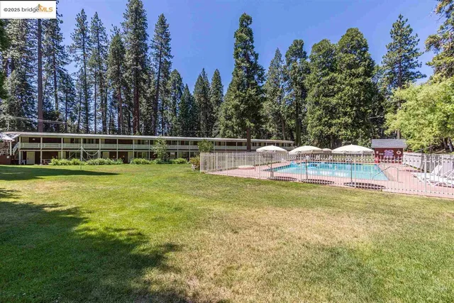 a view of a house with a big yard