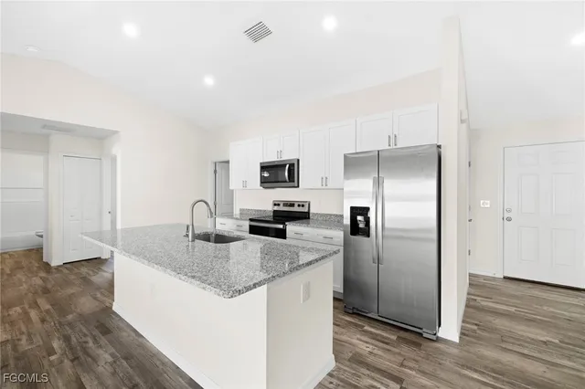 $299,000 | 2824 Northeast 2nd Avenue, Cape Coral, FL 33909