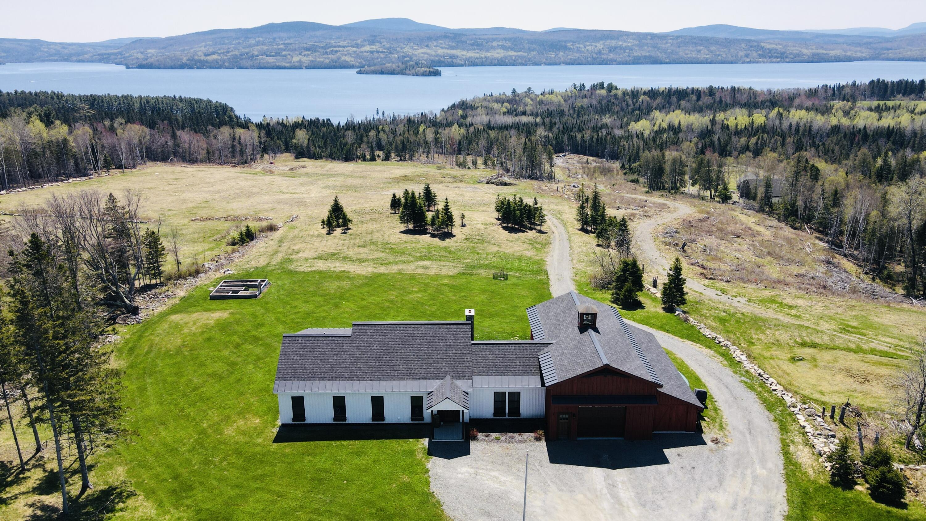 3062 Main Street Rangeley, ME 04970 - Photo 2 of 55 dji_fly_20250514_120708_594_174723884977