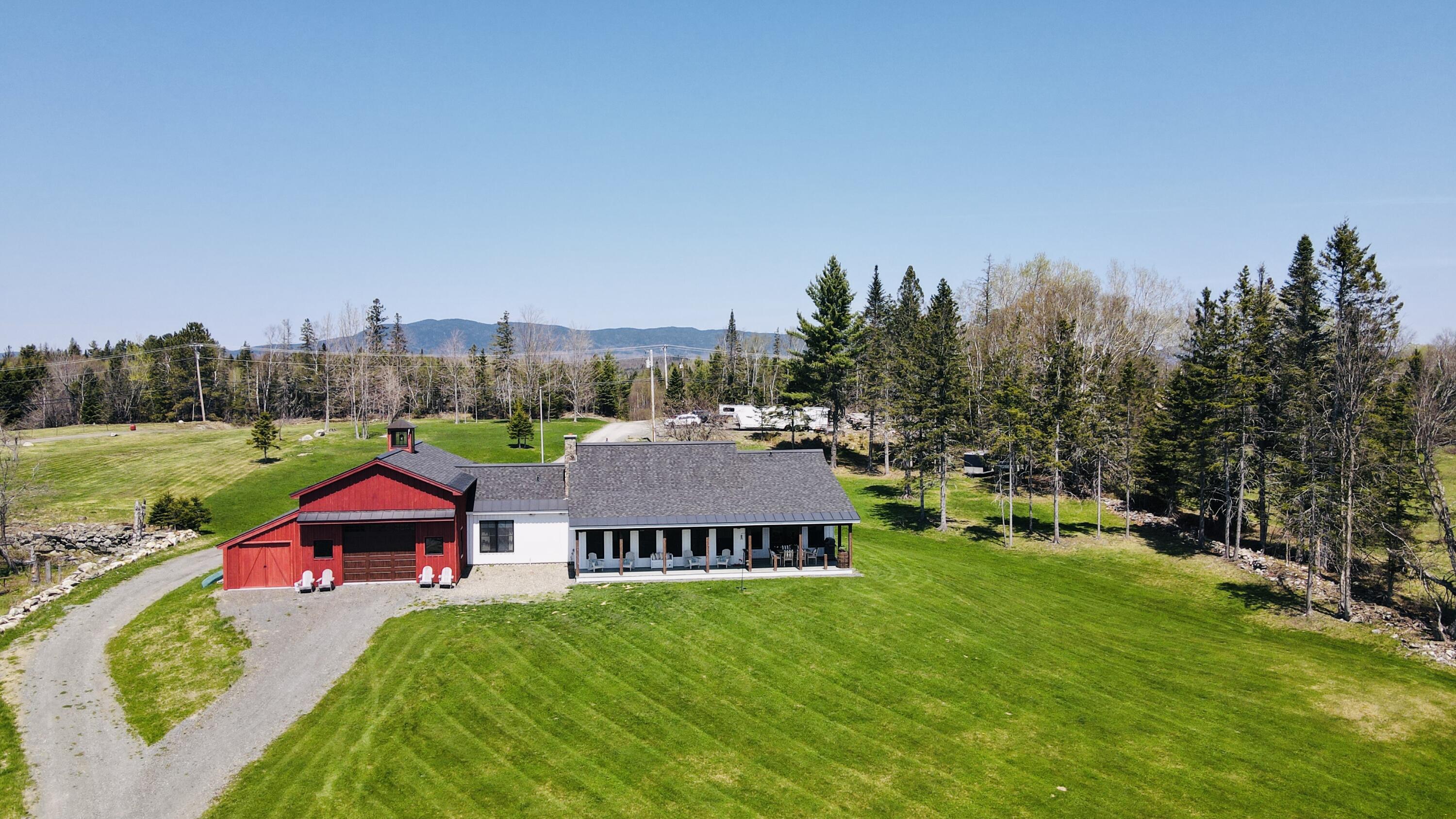 3062 Main Street Rangeley, ME 04970 - Photo 6 of 55 dji_fly_20250514_120840_598_174723894053