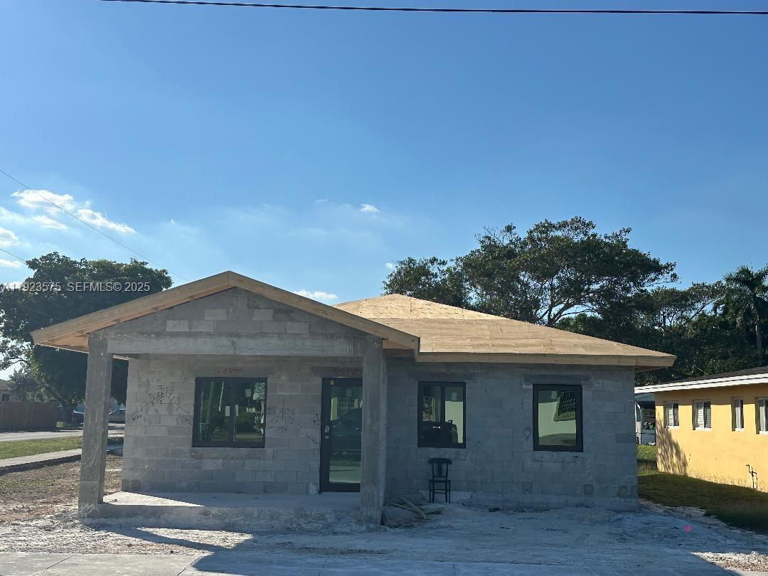580 Southwest 10th Avenue Homestead, FL 33030 - Photo 1 of 1 a front view of a house with yard