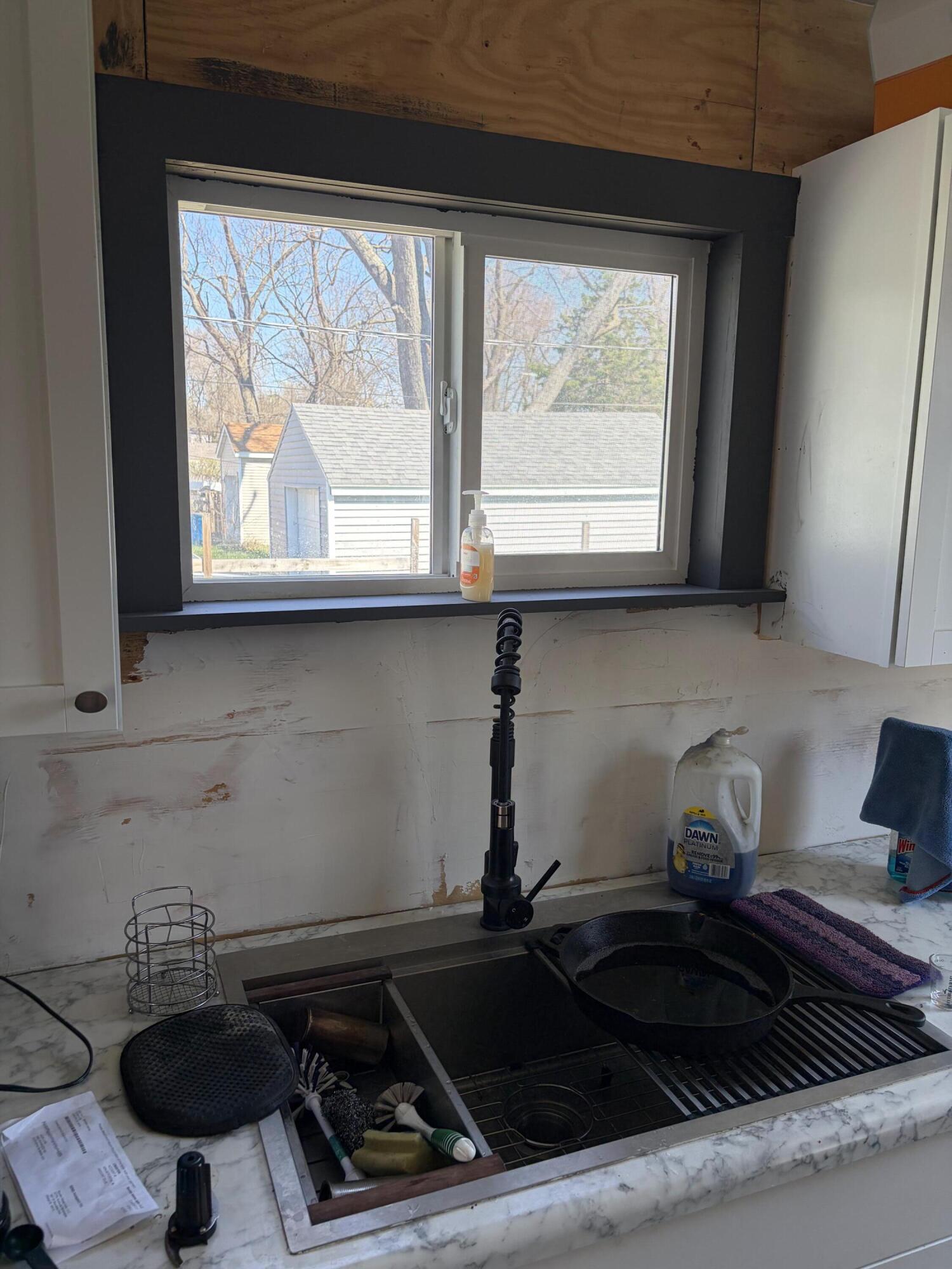 54252 North Ironwood Road South Bend, IN 46635 - Photo 19 of 21 a kitchen with a stove and a window