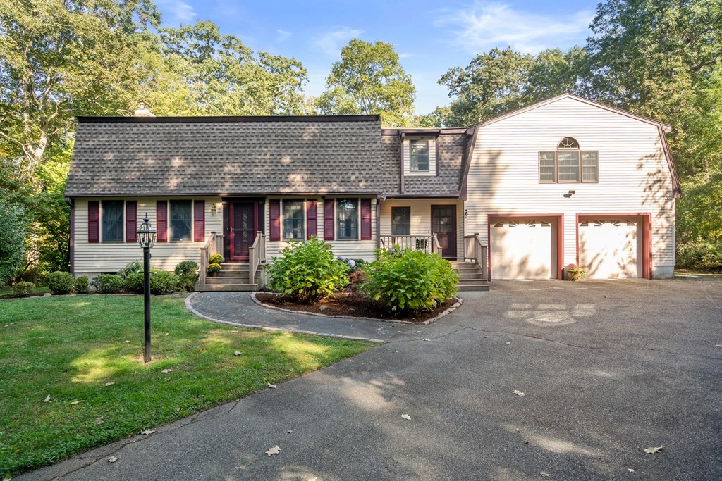 front view of house with a yard