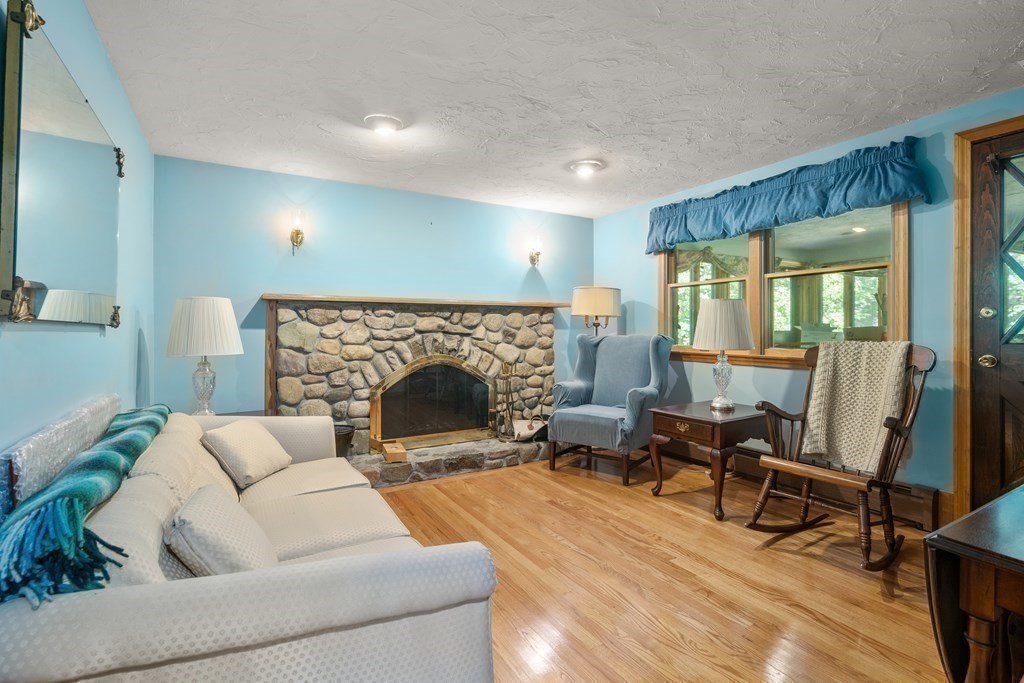 22 Robbin Road Canton, MA 02021 - Photo 17 of 40 a living room with furniture and a fireplace