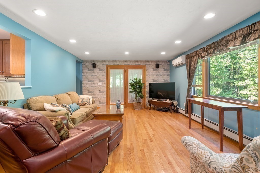 22 Robbin Road Canton, MA 02021 - Photo 19 of 40 a living room with furniture and a flat screen tv