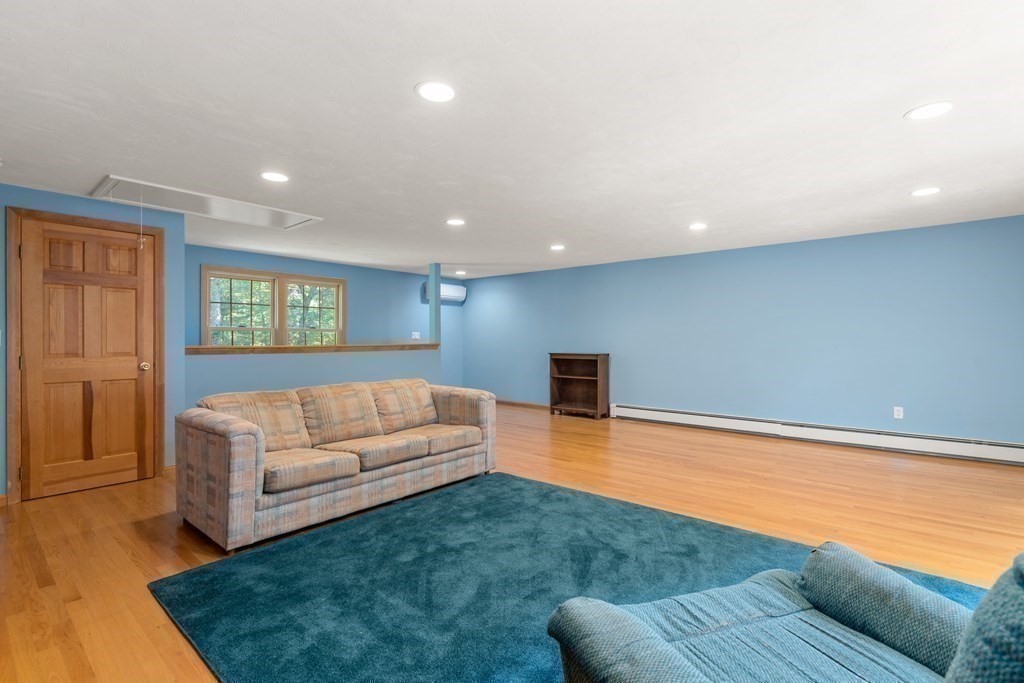 22 Robbin Road Canton, MA 02021 - Photo 26 of 40 a living room with furniture and a couch